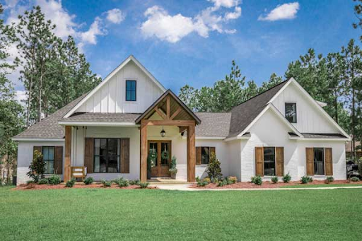 Country house plans: Country style house plan exterior with board-and-batten siding, timber porch posts, and metal | Monster House Plans