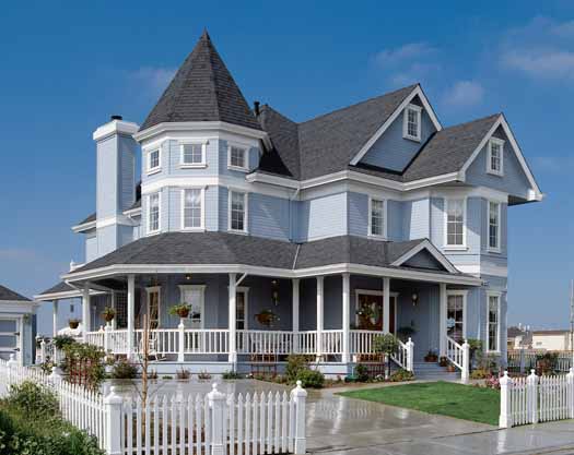 Farmhouse house plans: Victorian farmhouse house plan exterior with a corner turret, wraparound porch, and picket | Monster House Plans