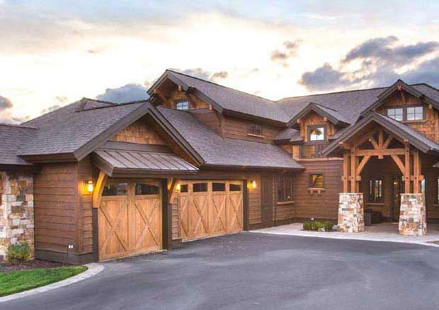 House plans - Craftsman house plan exterior with timber accents, stone columns, and a three-car garage | Monster House Plans